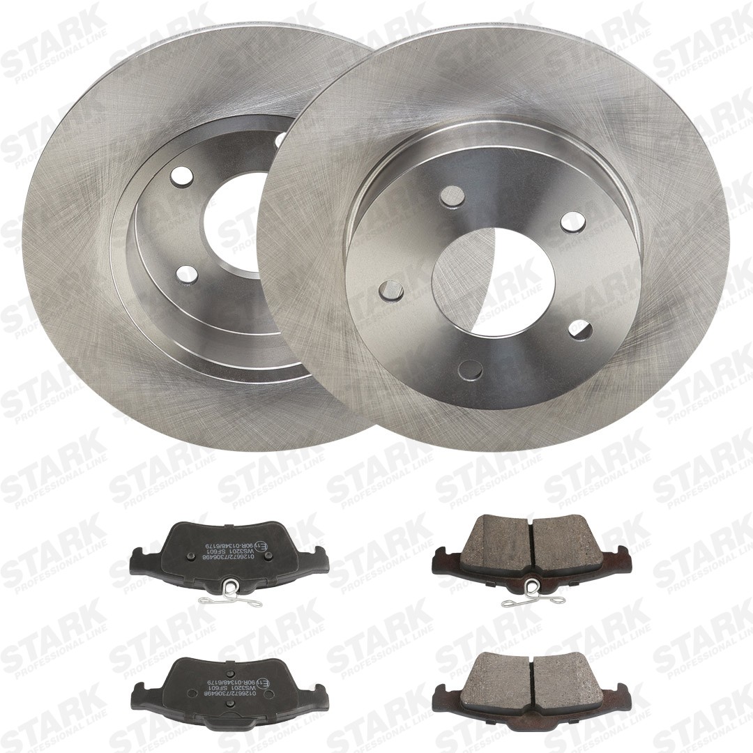 STARK Remschijven en blokken SKBK-10993357 SKBK-10993357 Remschijven en blokken, set NISSAN URVAN STARK